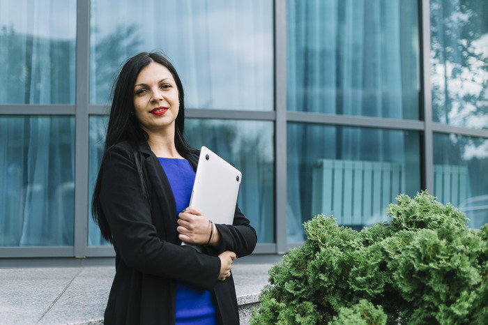 Female student at Chandigarh University celebrating Women's Day and pursuing an MBA for leadership and career growth.
								